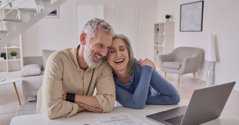 Older couple, laughing, benefits of budgeting